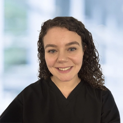 A headshot of Cat, a Office Manager at Hollern Chiropractic Spine and Disc.